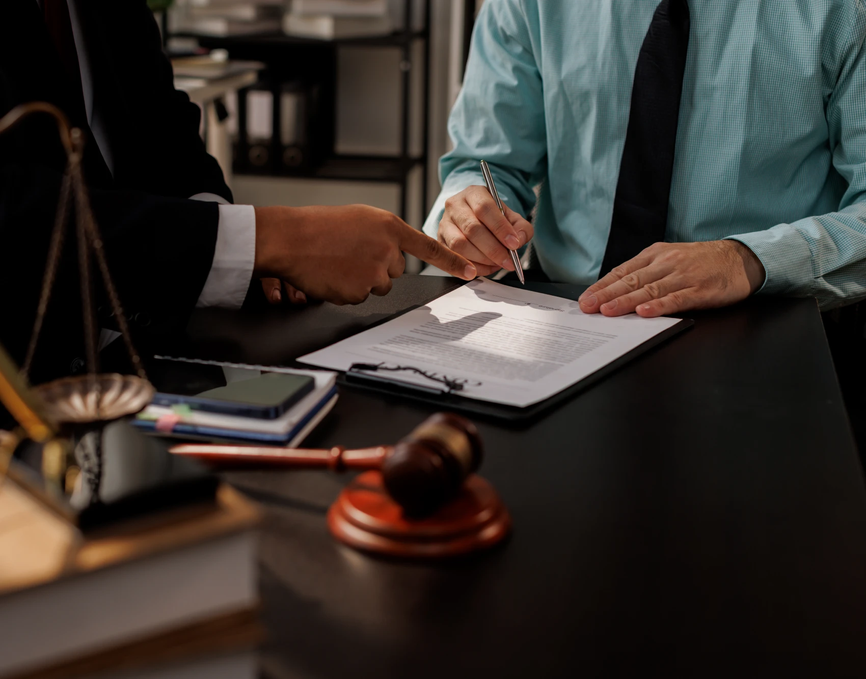 Lawyers reviewing a document together